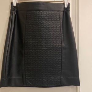 Black pleather a-line skirt with pattern in the front